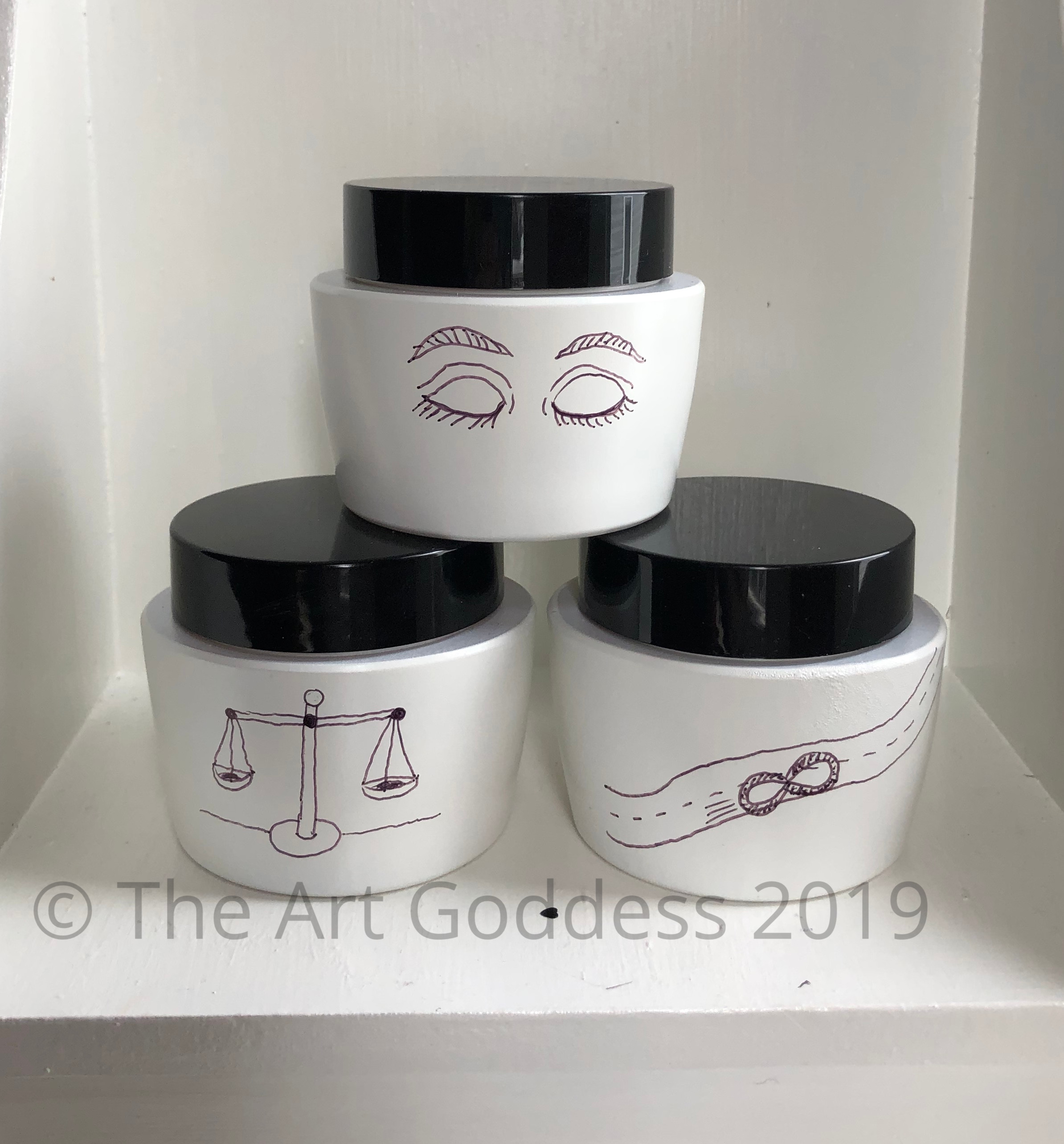 Eyes Closed, Scales, and Infinity Road Un-Fortune Jars